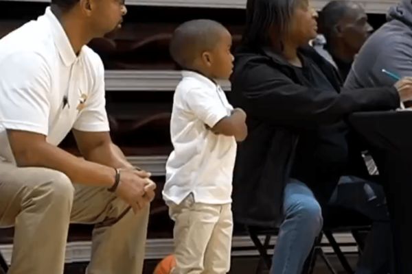The youngest coach is going viral and he’s adorable