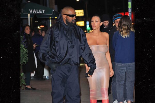 Bianca Censori Looks Completely Naked Under Condom-Style Dress with Kanye